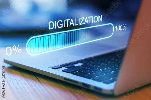 Digital world concept with hologram digitalization word and loading bar element icon on laptop keyboard background photo