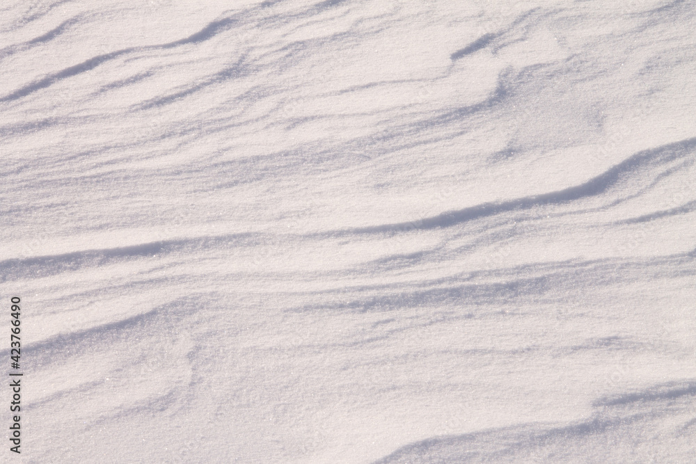 texture of fresh white snow, with a zigzag pattern from the wind texture of fresh white snow, with a zigzag pattern from the wind