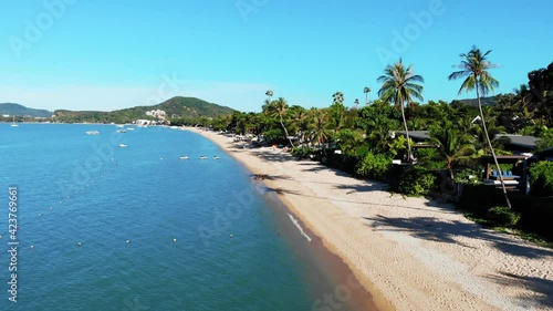 Wallpaper Mural Aerial dolly in view of people on a tropical sand beach by a luxury resort in Thailand Torontodigital.ca