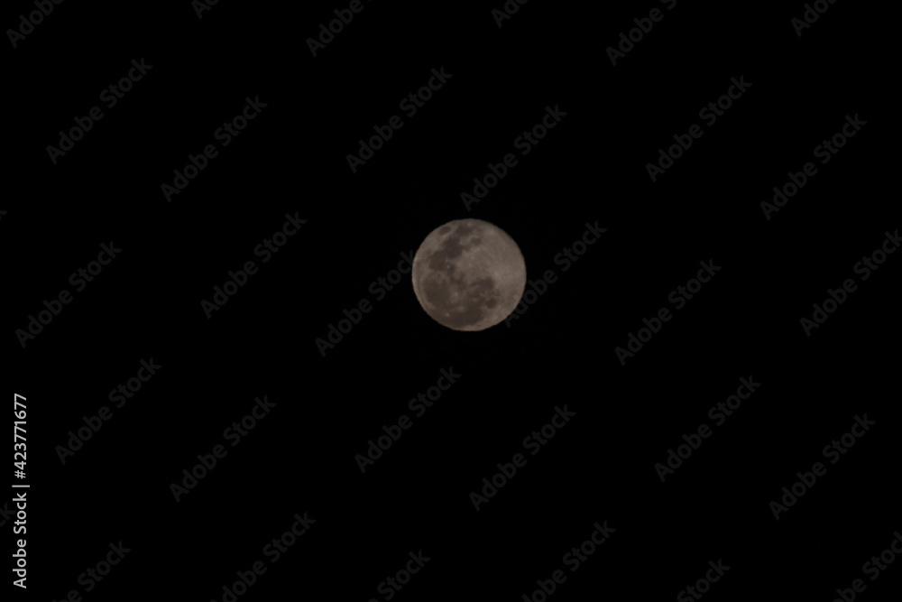 Full moon close-up. Black background Full moon close-up. Black background