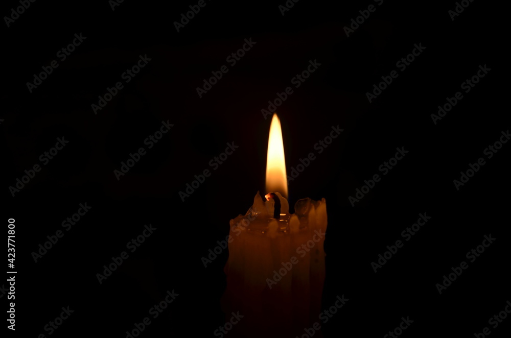 candle flame on dark background candle flame on dark background