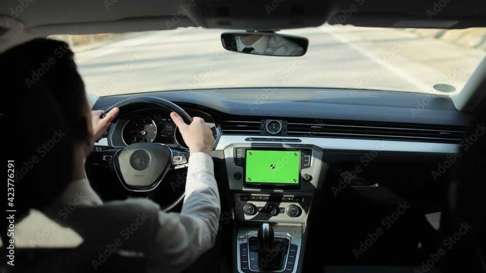 Green screen on dashboard car panel with driving male person on ...
