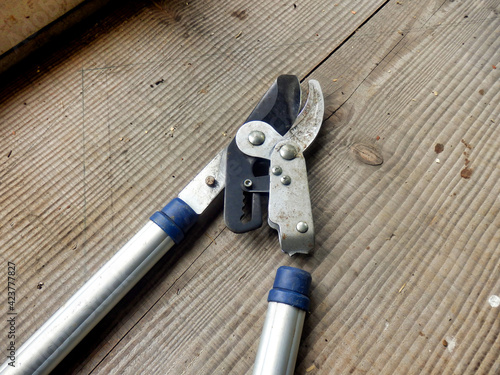 Close up of a broke pair of hand loppers showing where the metal fractured
 photo