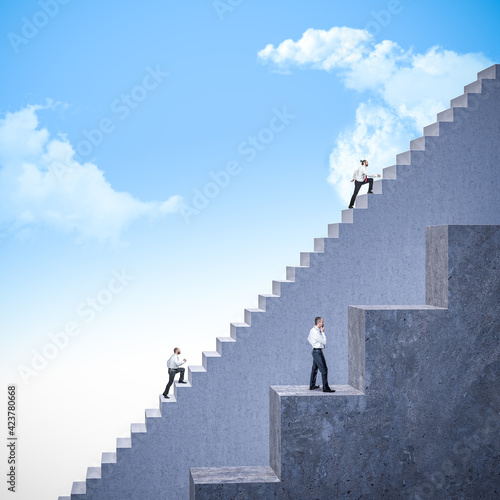 business people climbing stairs of different sizes.