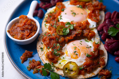 Huevos rancheros with red beans