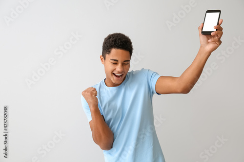 Happy African-American teen...