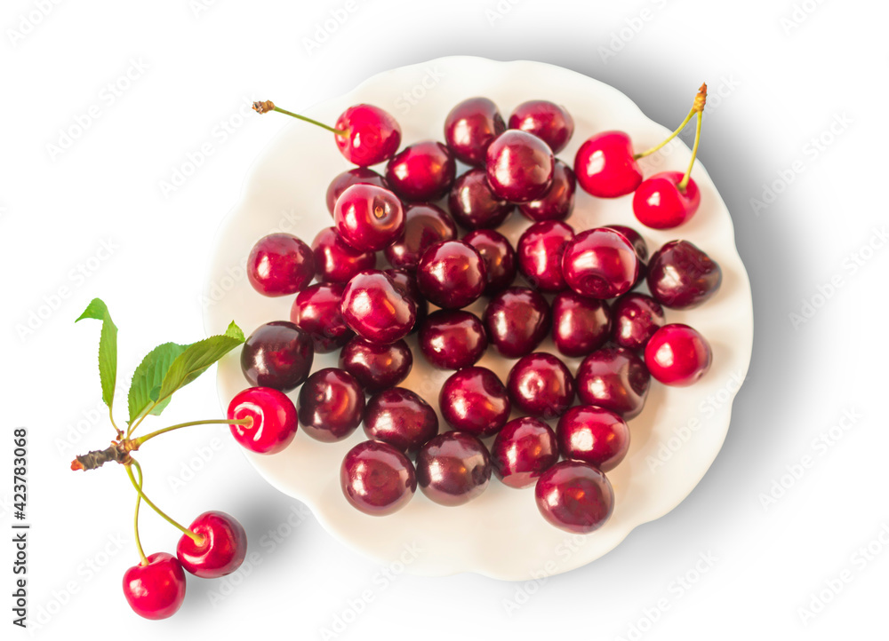 Fresh cherry in a plate, sweet eating, isolated on a white background. Top view. Fresh cherry in a plate, sweet eating, isolated on a white background. Top view.