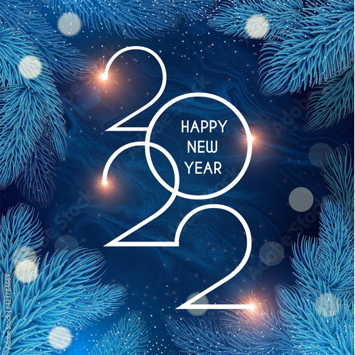 Happy new 2022 year Elegant text with fir tree branches and light bokeh effect. Minimalistic text template.