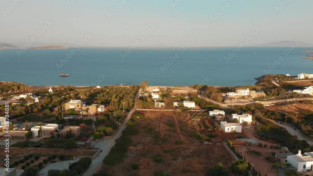 Aerial forward over countryside near Soros beach on Antiparos island, Greece. Aerial forward over countryside near Soros beach on Antiparos island, Greece.
