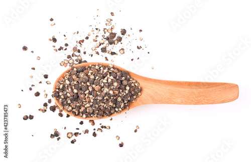 Ground black pepper isolated on a white background. Top view
