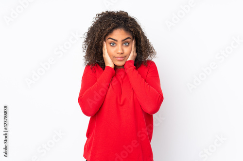 Young African American woman isolated on background frustrated and covering ears