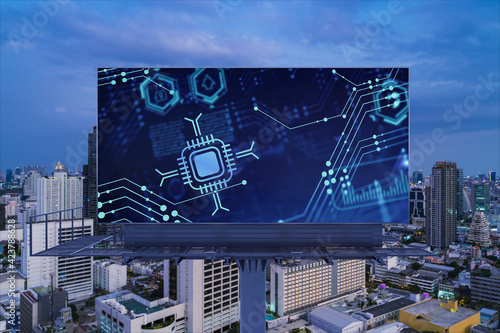 Information flow hologram on road billboard, night panorama city view of Bangkok. The largest technological center in Southeast Asia. The concept of programming science.