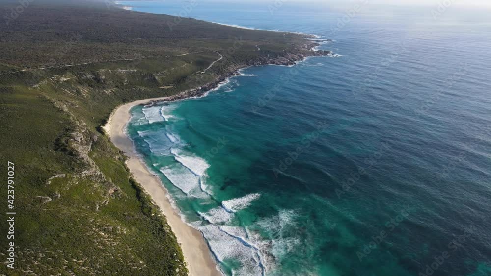 Aerial flight up high view idyllic empty beach turquoise water and white sand Paradise. Conto Beach, Australia. 4K and 60 fps to make slow motion.