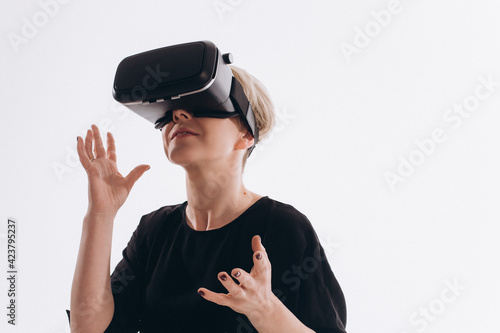 Close up woman portrait in vr glasses on isolated white background. Technology, virtual reality concept