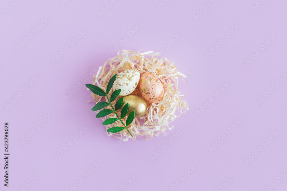 Easter background with eggs in a nest and green leaf. Easter background with eggs in a nest and green leaf.