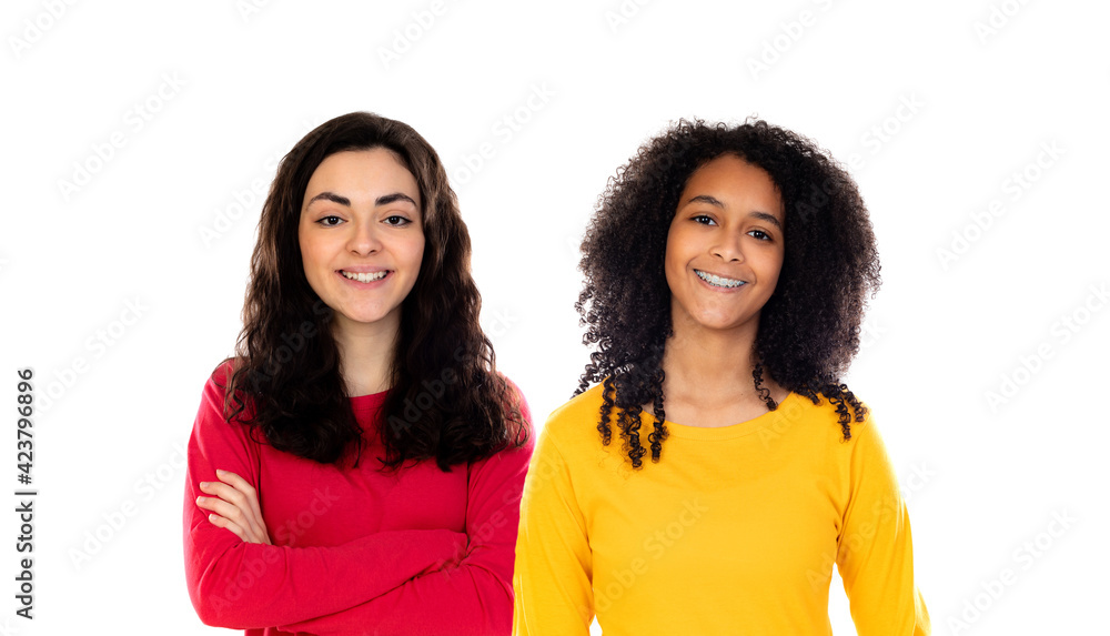 Two beautiful young girs with colorful sweaters Two beautiful young girs with colorful sweaters