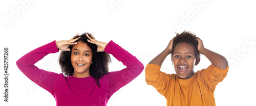 Two astonished african children isolated on a white background