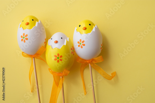 Easter eggs on colorful yellow background family illustration