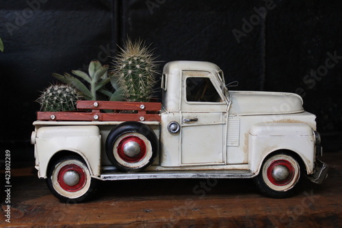 old truck toy planter for cacti