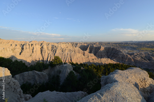 The unusual terrain and landscape at Badlands National Park during golden hour