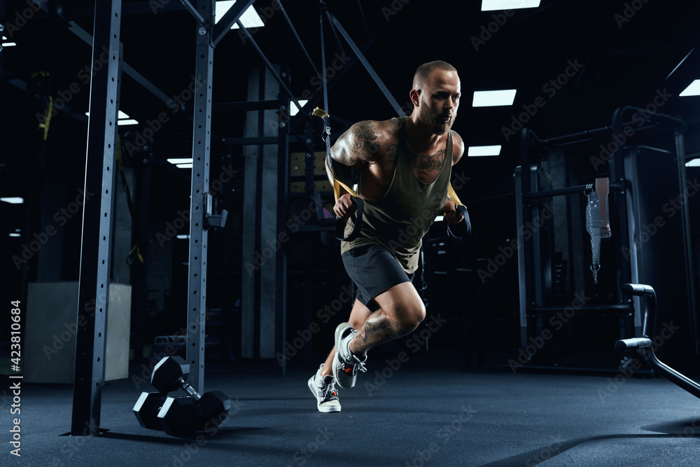 Sportsman running in place in gym. Sportsman running in place in gym.