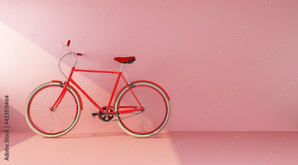 red bike on pink wall side view