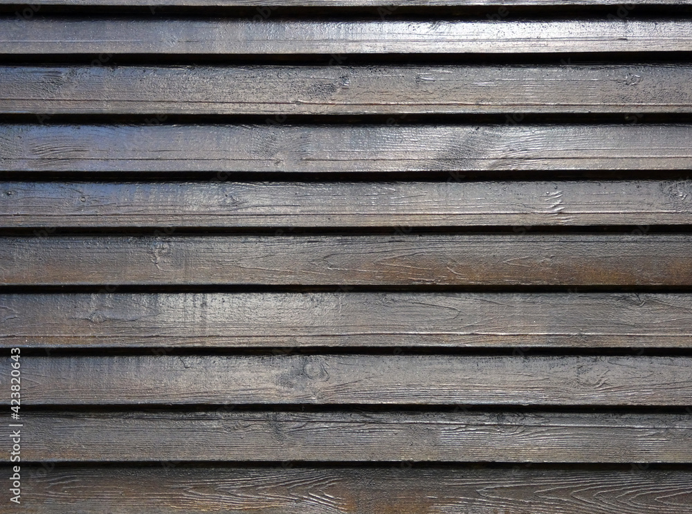 Obraz premium Horizontal dark wooden planks, can be used as background