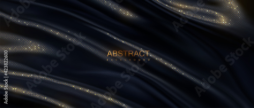 Black wavy textile with golden glitters pattern