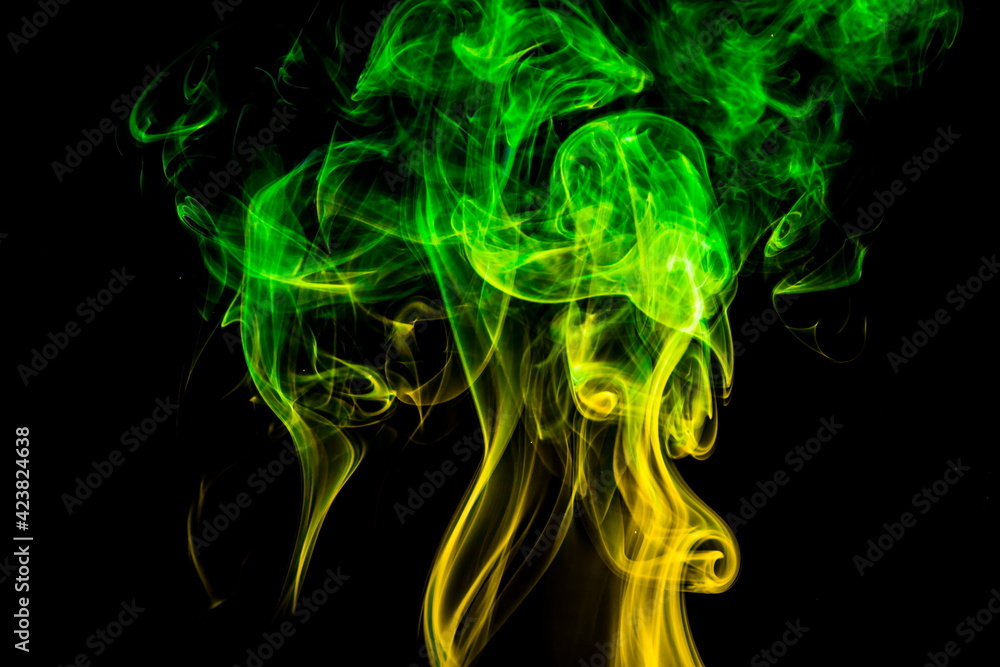 Obraz premium Colored smoke on black background