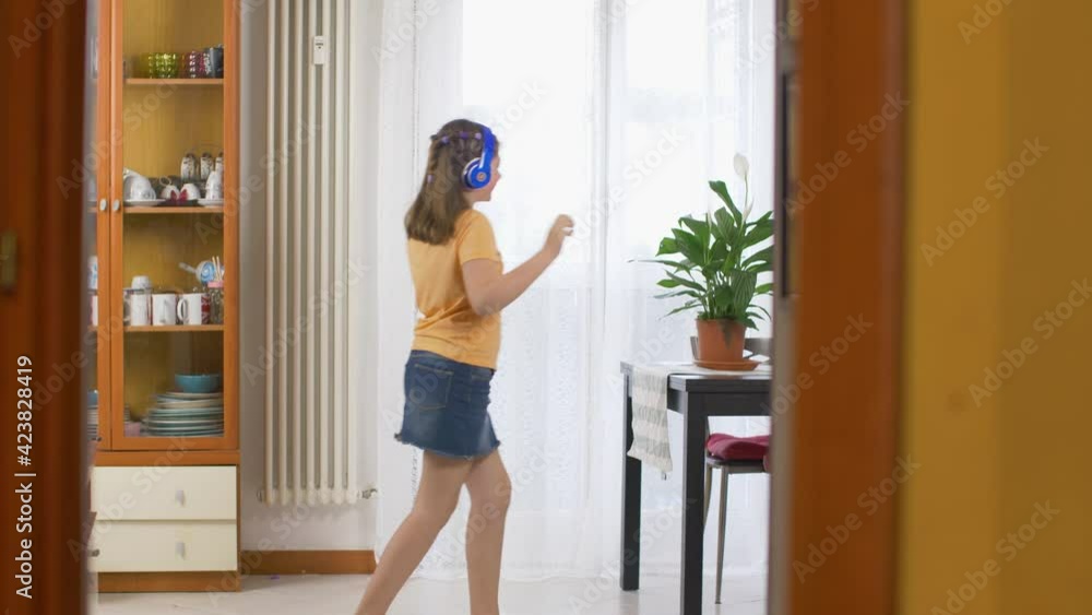 young girl is sancing and having fun at home young girl is sancing and having fun at home