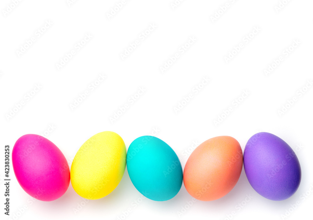 Multi-colored holiday eggs. Eggs on a white background for a postcard Multi-colored holiday eggs. Eggs on a white background for a postcard