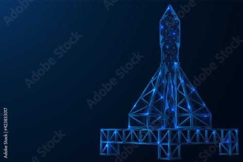 A platform for launching spacecraft into space. Racks with a rocket. Polygonal construction of concatenated lines and points. Blue background.