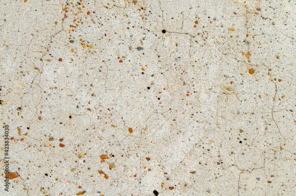 An old concrete wall in an underground garage. An old concrete wall in an underground garage.