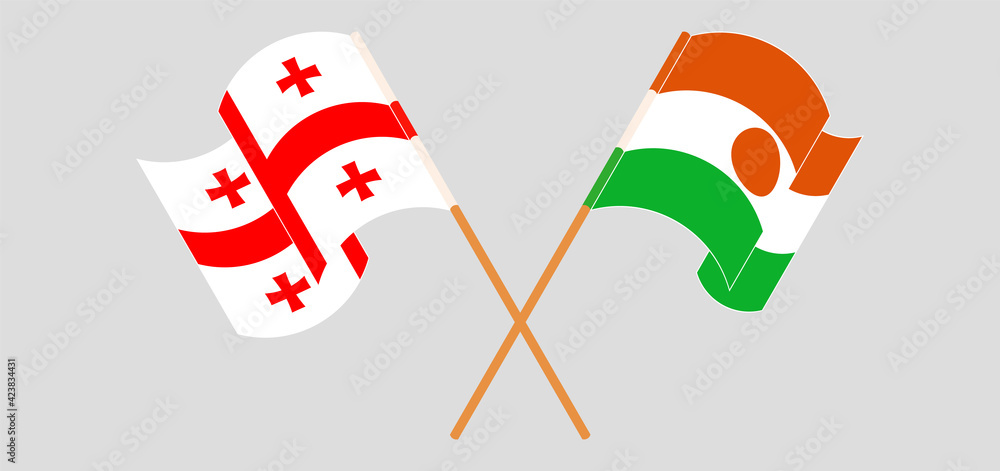 Crossed and waving flags of Georgia and Niger Crossed and waving flags of Georgia and Niger