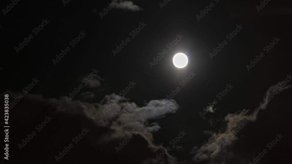 time lapse video of the moon coming through the clouds time lapse video of the moon coming through the clouds