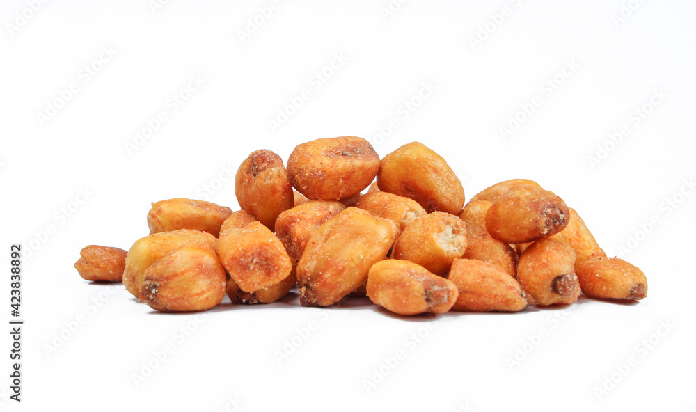 Pile of roasted corn seeds isolated on white background. Crunchy and salty snack Pile of roasted corn seeds isolated on white background. Crunchy and salty snack