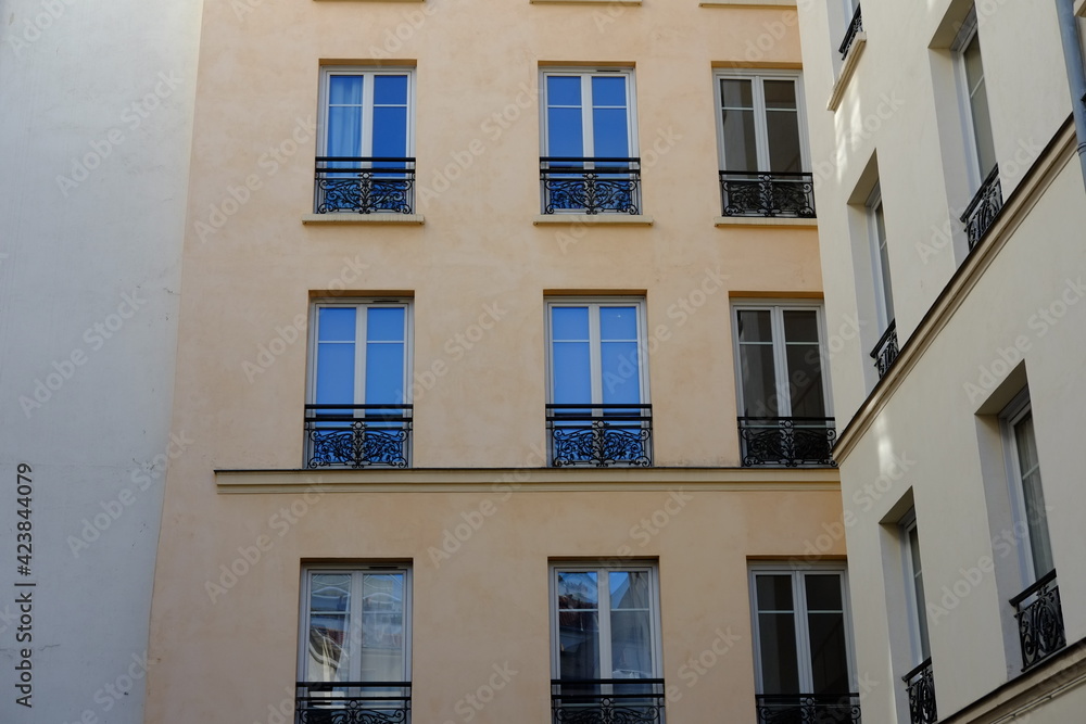 Parisians facades during a sunny day. march 2021, Paris France.