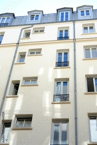 Parisians facades during a sunny day. march 2021, Paris France.