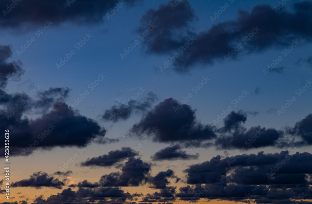 Dark clouds during sunset. Sunset full of gray clouds Dark clouds during sunset. Sunset full of gray clouds