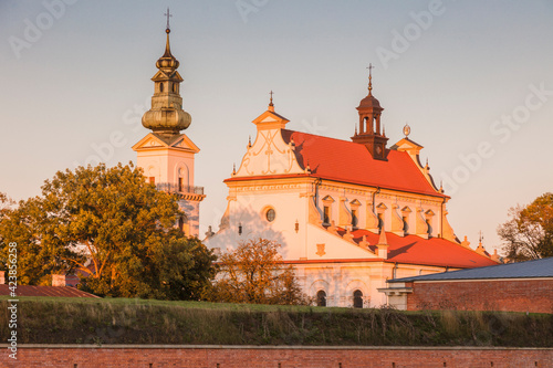 Poland, Lublin, Zamosc, Exterior of church and bell tower photo