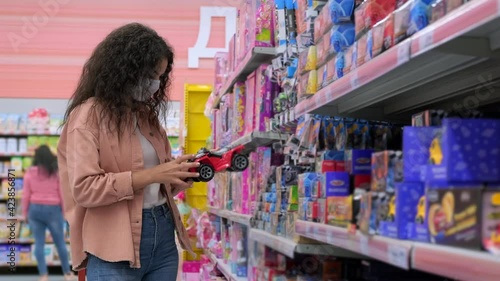 Customer buying toys in the superstore