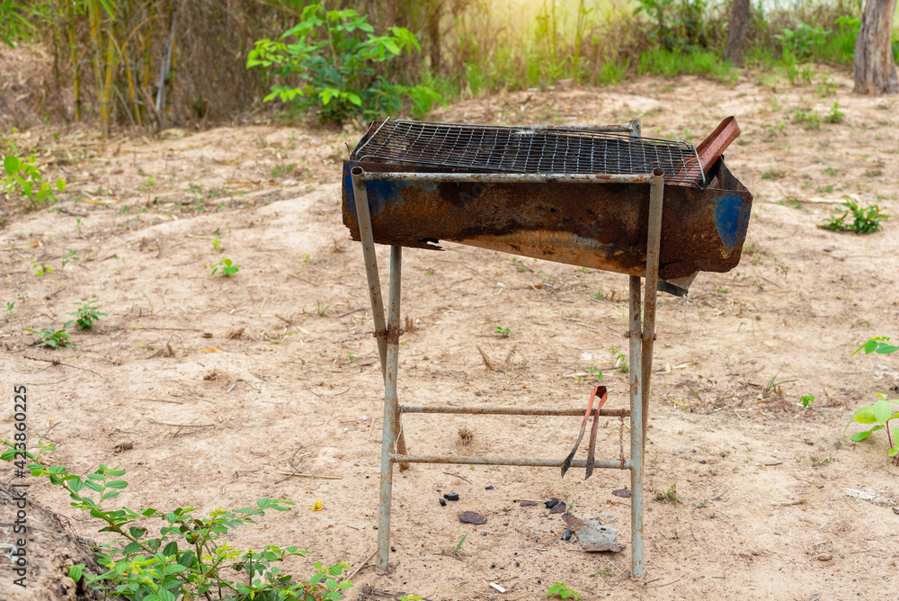 Old rusty barbecue grill cleaning dirty grid, Grate old for grill food.  Stock Photo | Adobe Stock