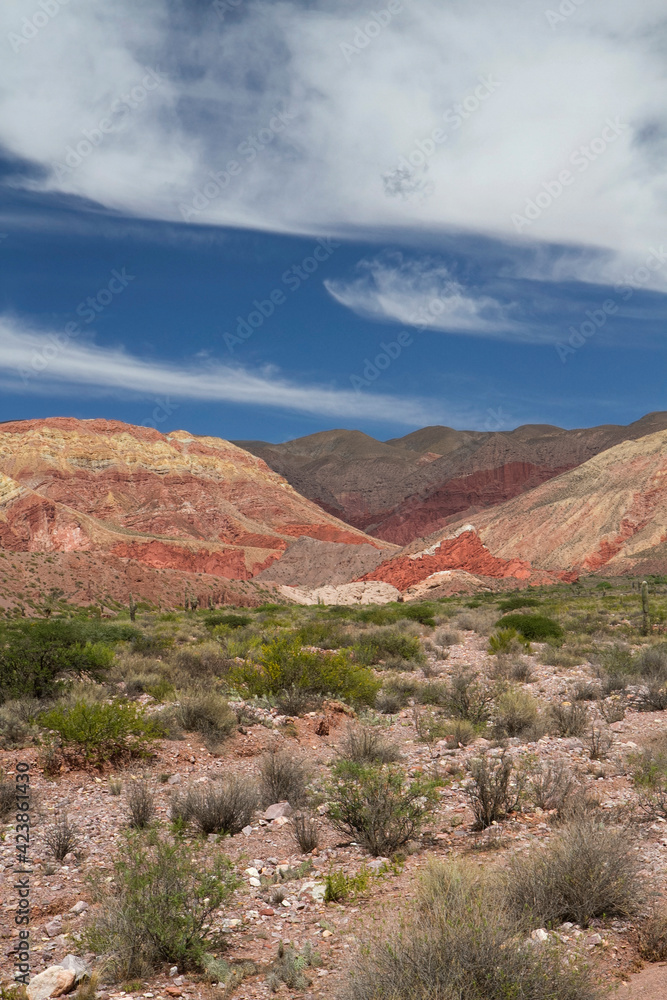 Hiking in the desert. View of the colorful rock and sandstone mountains in Humahuaca, Jujuy, Argentina.