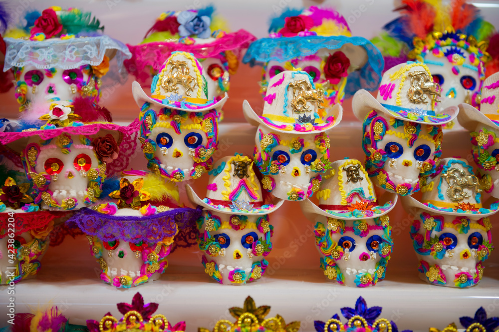 Candy skulls with hats for the day of the dead in Mexico Candy skulls with hats for the day of the dead in Mexico