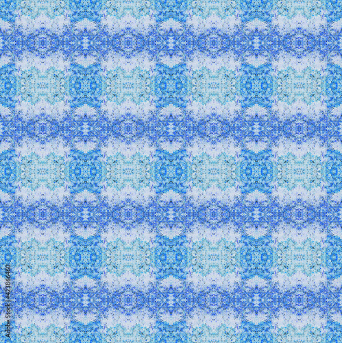 Pattern of cells in blue and cyan tones on a light background