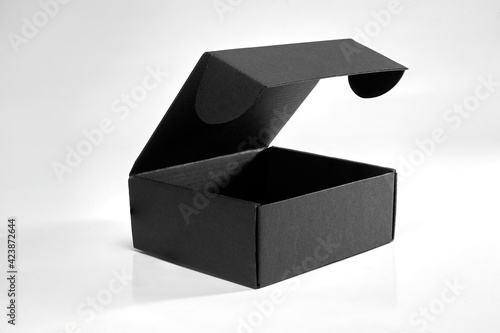 Square black box open isolated on white background photo