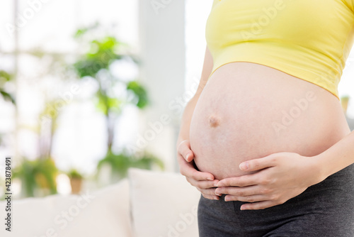 close up pregnant women belly