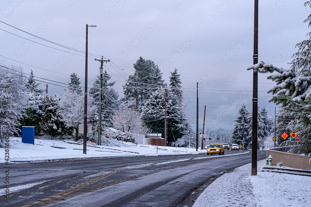 Driving in small town America after a snowfall Driving in small town America after a snowfall