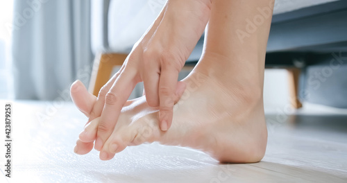 Woman scratch her athletes foot
