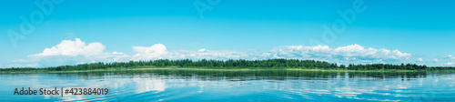 The beautiful landscape of big blue lake. Panorama, banner. Sunny summer day.